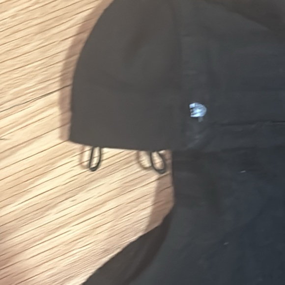 Black turtleneck buttons on the inside small circle on the back - Picture 3 of 4